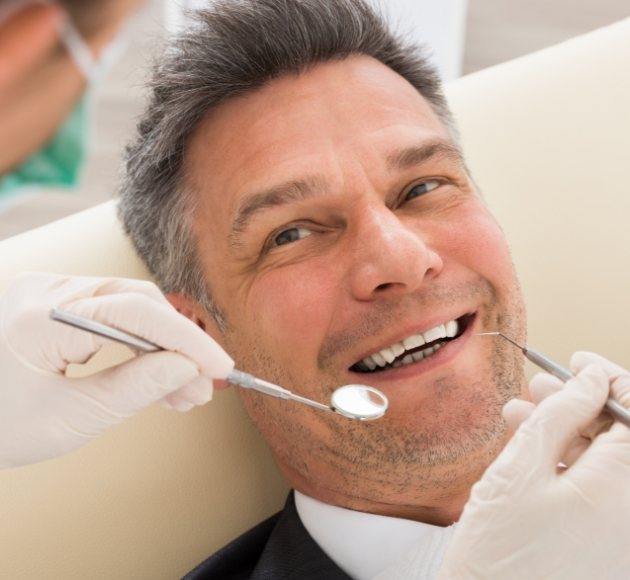 Man receiving dental treatment