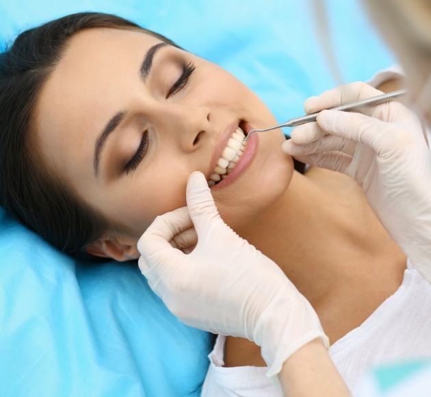 Patient receiving a deep cleaning for gum disease