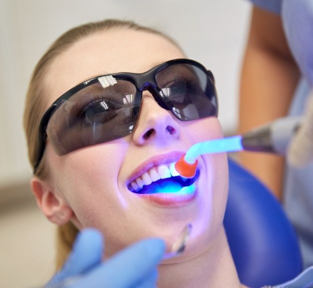 Patient receiving cosmetic dental bonding