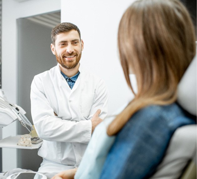 dentist talking to patient