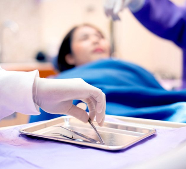 dentist about to work on dental patient