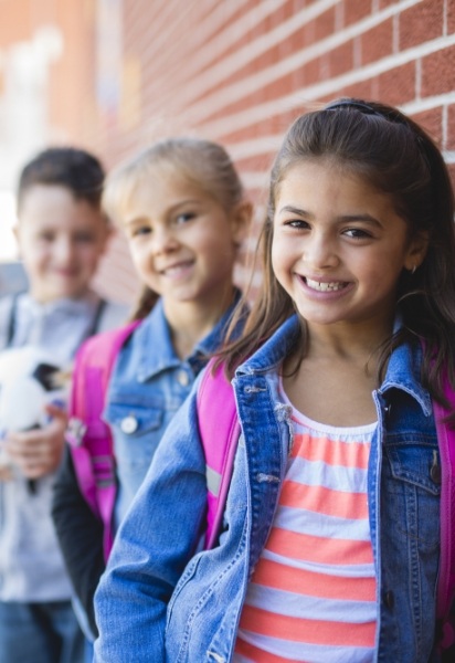 Kids with healthy smiles after children's dentistry