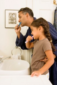 family dentist natick loves teaches families proper brushing