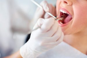 Woman receiving a dental checkup