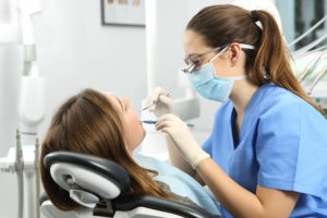 Woman having a cleaning at the dentist 