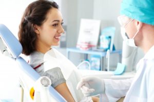 person talking to dentist